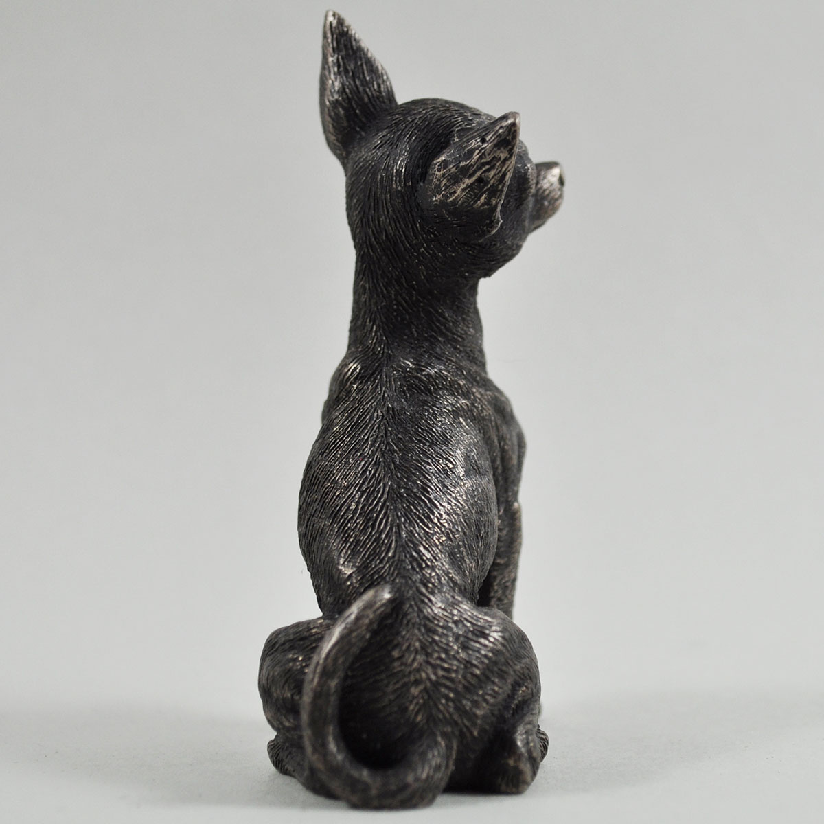 black and white chihuahua statue